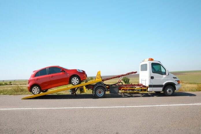 car towing car towing